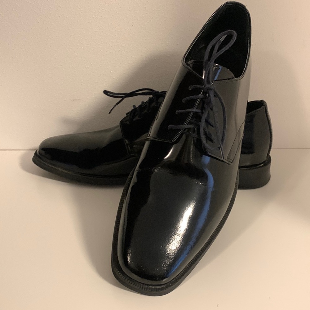 Jos A Bank Patent leather dress shoe. Gently used. Beautifully polished